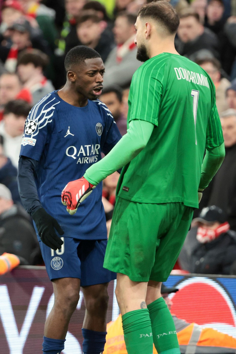 Ousmane Dembele of PSG celebrates with PSG goalkeeper Gianluigi Donnarumma scoring his penalty during the penalty shootout of the UEFA Champions League, Round of 16, 2nd leg football match between Liverpool FC and Paris Saint-Germain (PSG) on March 11, 20