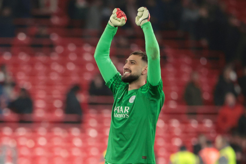 PSG goalkeeper Gianluigi Donnarumma celebrates the victory following the penalty shootout of the UEFA Champions League, Round of 16, 2nd leg football match between Liverpool FC and Paris Saint-Germain (PSG) on March 11, 2025 at Anfield stadium in Liverpoo