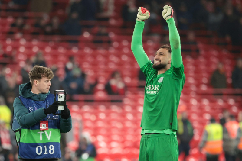 PSG goalkeeper Gianluigi Donnarumma celebrates the victory following the penalty shootout of the UEFA Champions League, Round of 16, 2nd leg football match between Liverpool FC and Paris Saint-Germain (PSG) on March 11, 2025 at Anfield stadium in Liverpoo