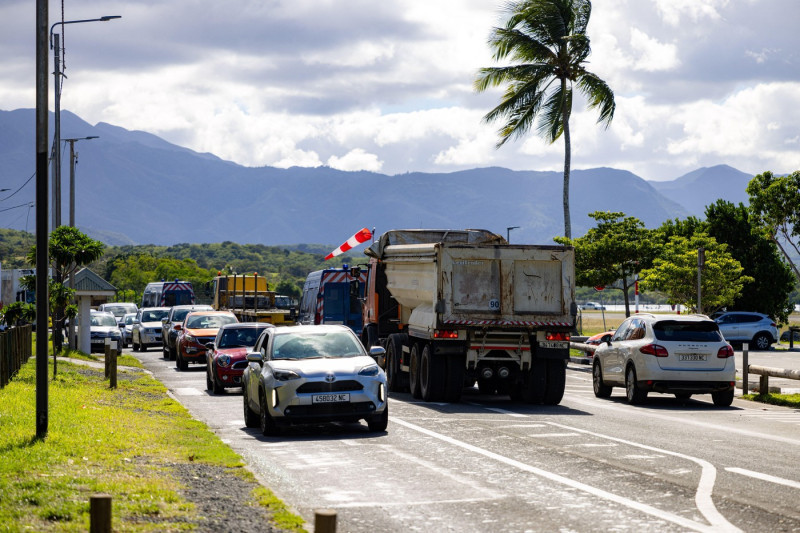 Friday, May 24 - Nouméa - Convoy of equipment for clearing roads accompanied by law enforcement at Magenta Beach. President Emmanuel Macron says he will not force through a controversial voting reform in the French Pacific territory of New Caledonia follo
