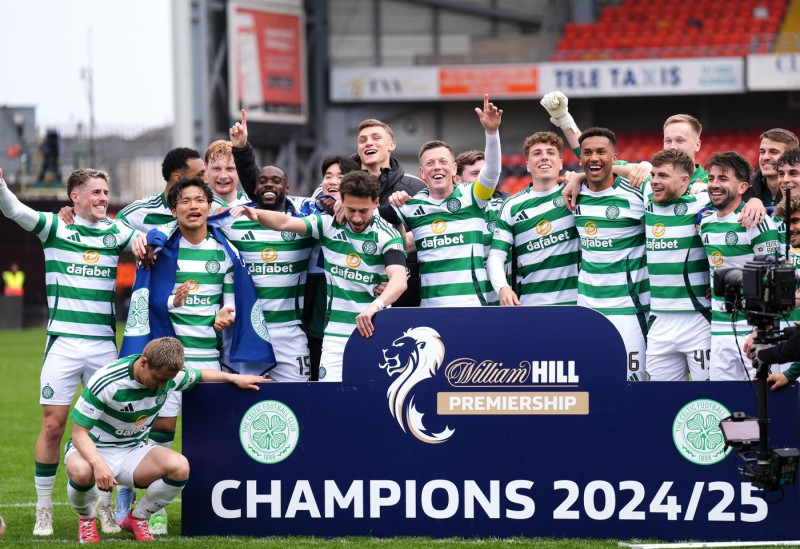 Celtic players celebrate victory in the William Hill Premiership following the William Hill Premiership match at Tannadice Park, Dundee. Picture date: Saturday April 26, 2025.
