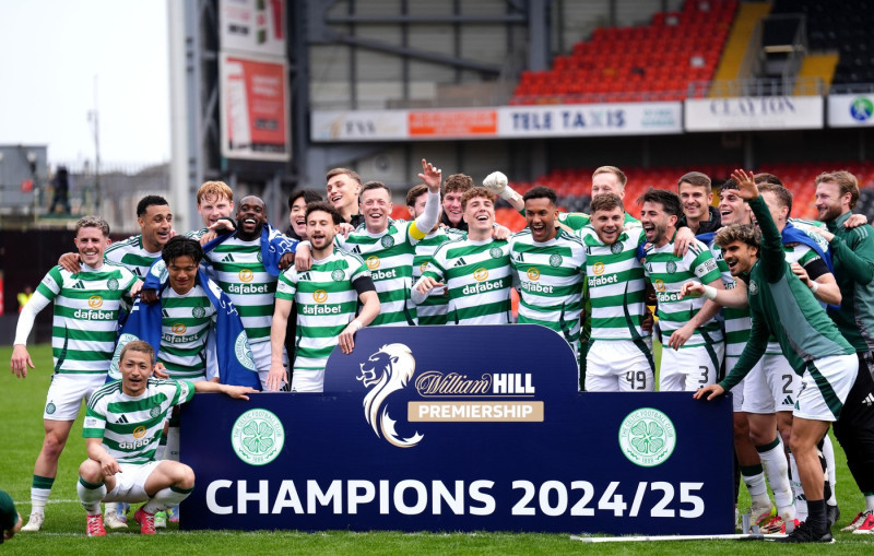 Celtic players celebrate victory in the William Hill Premiership following the William Hill Premiership match at Tannadice Park, Dundee. Picture date: Saturday April 26, 2025.
