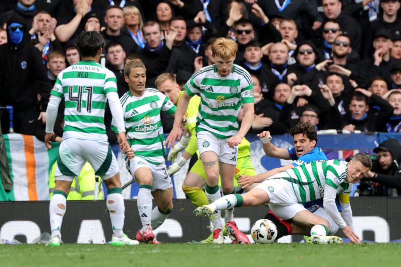Celtic's Callum McGregor (right) challenges Rangers' Ianis Hagi during the William Hill Premiership match at Ibrox Stadium, Glasgow. Picture date: Sunday May 4, 2025.