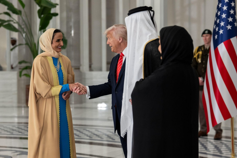 President Donald Trump participates in a receiving line with Amir of Qatar Sheikh Tamin bin Hamad Al Thani and his wife, Sheikha Jawaher, at an official State Dinner at Lusail Palace in Doha, Qatar, Wednesday, May 14, 2025. (Official White House Photo by