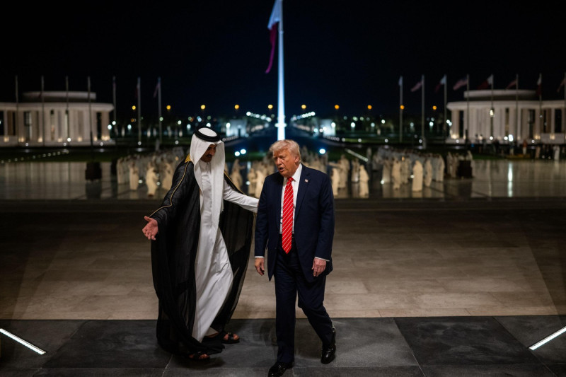 President Donald Trump is greeted by Amir of Qatar Sheikh Tamin bin Hamad Al Thani at Lusail Palace in Doha, Qatar, Wednesday, May 14, 2025, to attend an official State Dinner. (Official White House Photo by Daniel Torok)