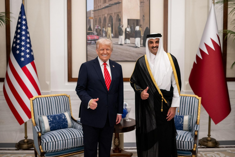 President Donald Trump poses for a photo with Amir of Qatar Sheikh Tamin bin Hamad Al Thani in Lusail Palace before an official State Dinner, Wednesday, May 14, 2025, in Doha, Qatar. (Official White House Photo by Daniel Torok)