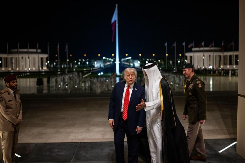 President Donald Trump is greeted by Amir of Qatar Sheikh Tamin bin Hamad Al Thani at Lusail Palace in Doha, Qatar, Wednesday, May 14, 2025, to attend an official State Dinner. (Official White House Photo by Daniel Torok)