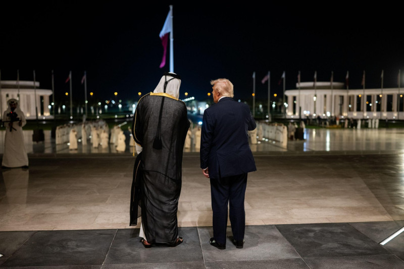 President Donald Trump is greeted by Amir of Qatar Sheikh Tamin bin Hamad Al Thani at Lusail Palace in Doha, Qatar, Wednesday, May 14, 2025, to attend an official State Dinner. (Official White House Photo by Daniel Torok)