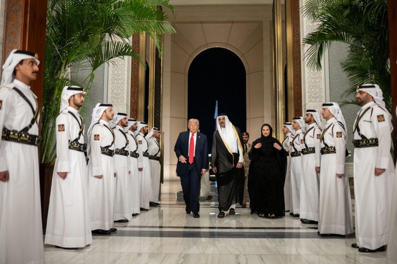 President Donald Trump is greeted by Amir of Qatar Sheikh Tamin bin Hamad Al Thani and his wife, Sheikha Jawaher, before an official State Dinner at Lusail Palace in Doha, Qatar, Wednesday, May 14, 2025. (Official White House Photo by Daniel Torok)