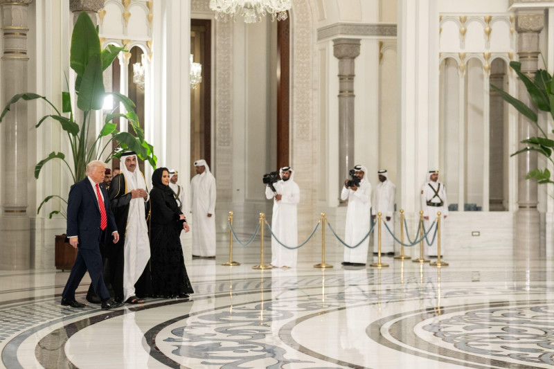 President Donald Trump is greeted by Amir of Qatar Sheikh Tamin bin Hamad Al Thani and his wife, Sheikha Jawaher, before an official State Dinner at Lusail Palace in Doha, Qatar, Wednesday, May 14, 2025. (Official White House Photo by Daniel Torok)
