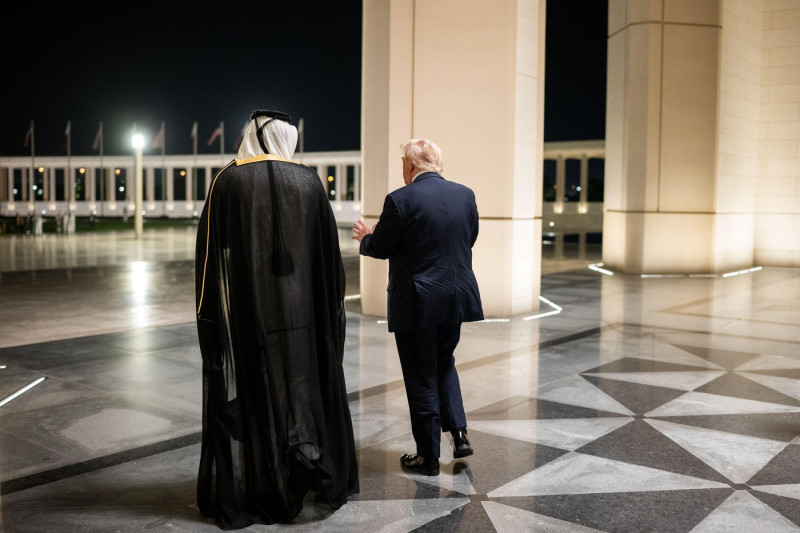 President Donald Trump is greeted by Amir of Qatar Sheikh Tamin bin Hamad Al Thani at Lusail Palace in Doha, Qatar, Wednesday, May 14, 2025, to attend an official State Dinner. (Official White House Photo by Daniel Torok)
