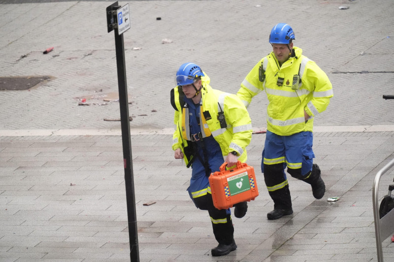 Police and emergency personnel dealing with a road traffic accident on Water Street near the Liver Building in Liverpool after a car collided with pedestrians during the Premier League winners parade. A man has been detained. Picture date: Monday May 26,