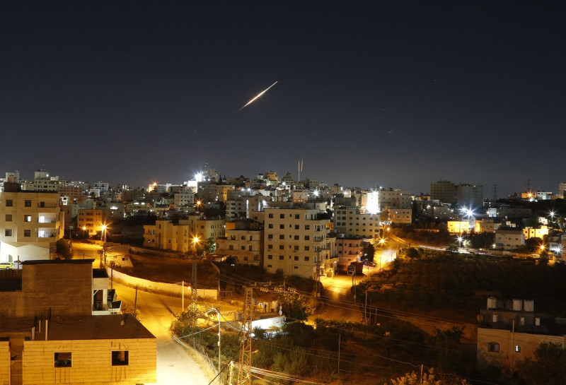 Iranian ballistic missiles illuminate night sky over Hebron, West Bank