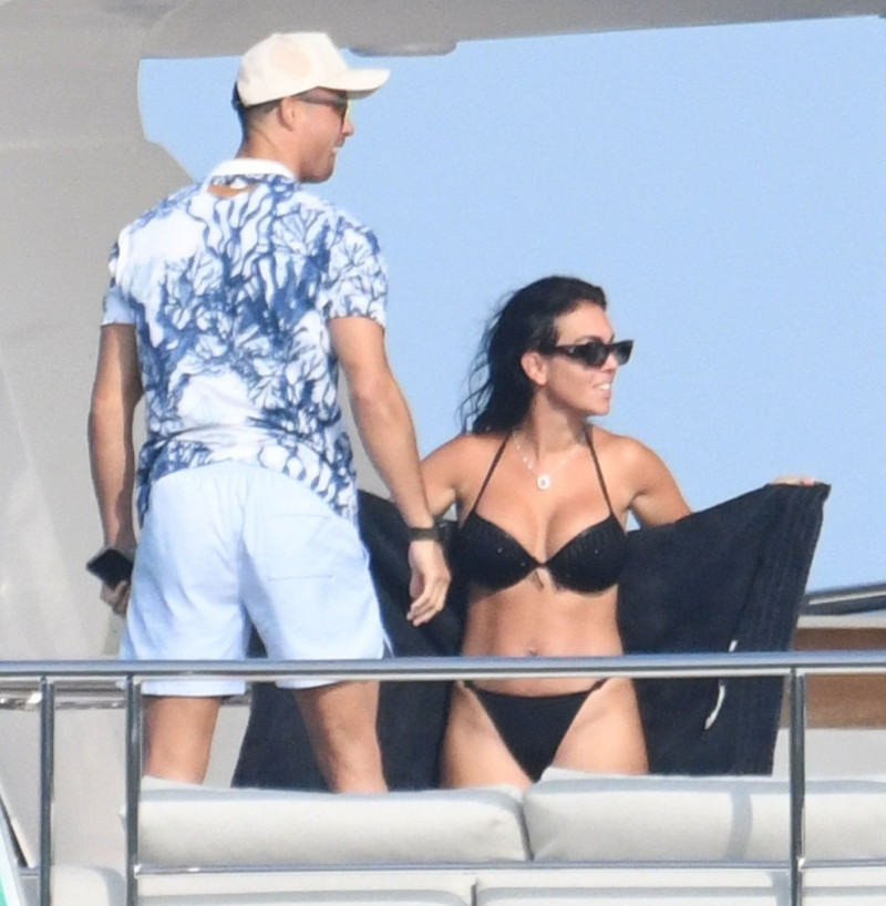 Portugal's Football Icon Cristiano Ronaldo who plays for the Saudi Professional League club Al Nassr is spotted with his sexy partner Georgina Rodriguez on holiday in Sardinia.