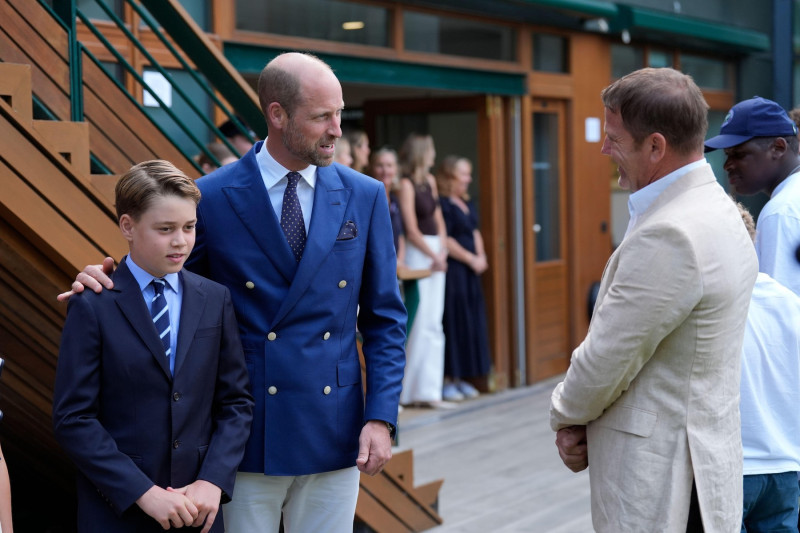 The Prince of Wales and Prince George meet Steve Backshall, on day fourteen of the 2025 Wimbledon Championships at the All England Lawn Tennis and Croquet Club, London. Picture date: Sunday July 13, 2025.