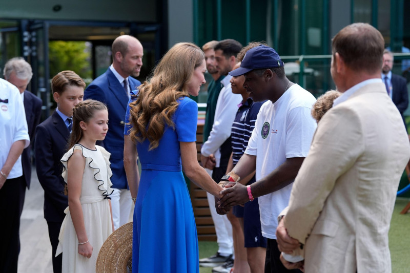 (left to right) Prince George, the Prince of Wales and the Princess of Wales are greeted as they arrive on day fourteen of the 2025 Wimbledon Championships at the All England Lawn Tennis and Croquet Club, London. Picture date: Sunday July 13, 2025.