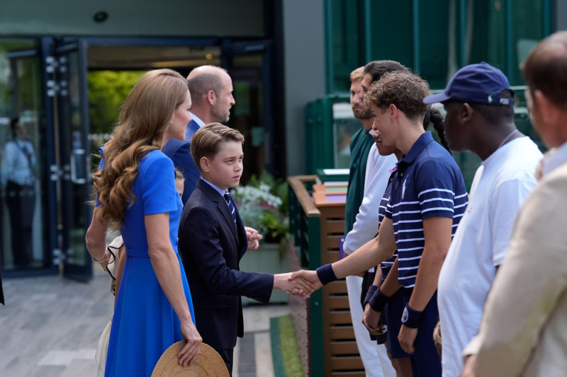 (left to right) Prince George, the Prince of Wales and the Princess of Wales are greeted as they arrive on day fourteen of the 2025 Wimbledon Championships at the All England Lawn Tennis and Croquet Club, London. Picture date: Sunday July 13, 2025.