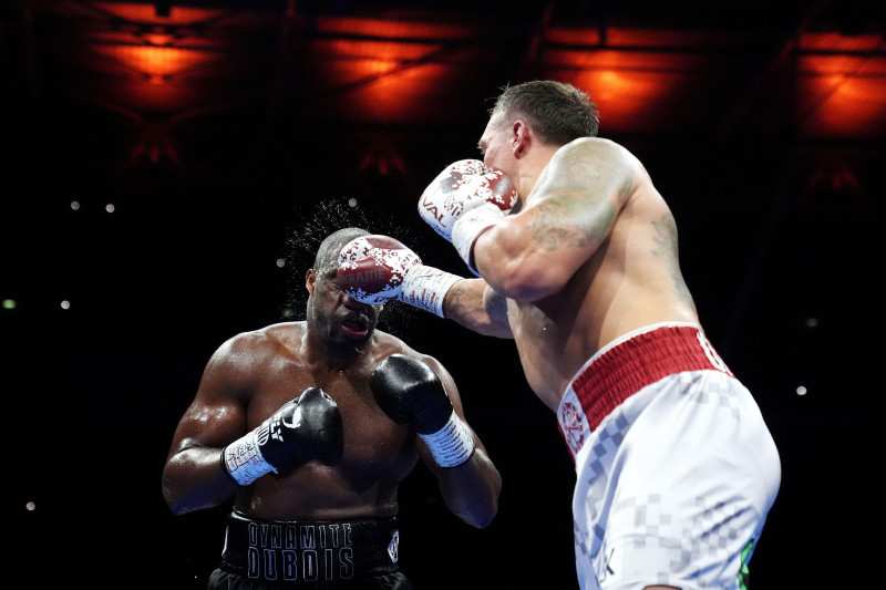 Oleksandr Usyk and Daniel Dubois (left) in action during their IBF, IBO, WBC and WBO World heavyweight bout at Wembley Stadium, London. Picture date: Saturday July 19, 2025.