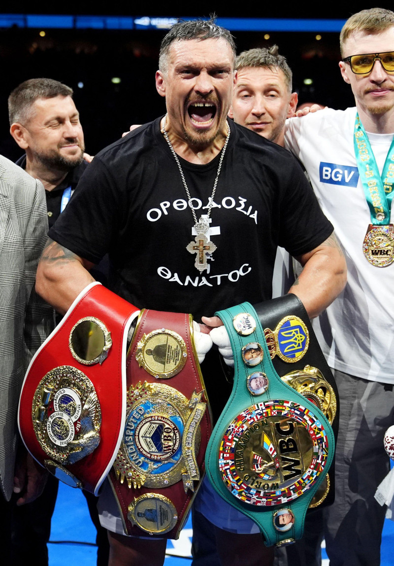 Oleksandr Usyk celebrates winning their IBF, IBO, WBC and WBO World heavyweight bout against Daniel Dubois at Wembley Stadium, London. Picture date: Saturday July 19, 2025.