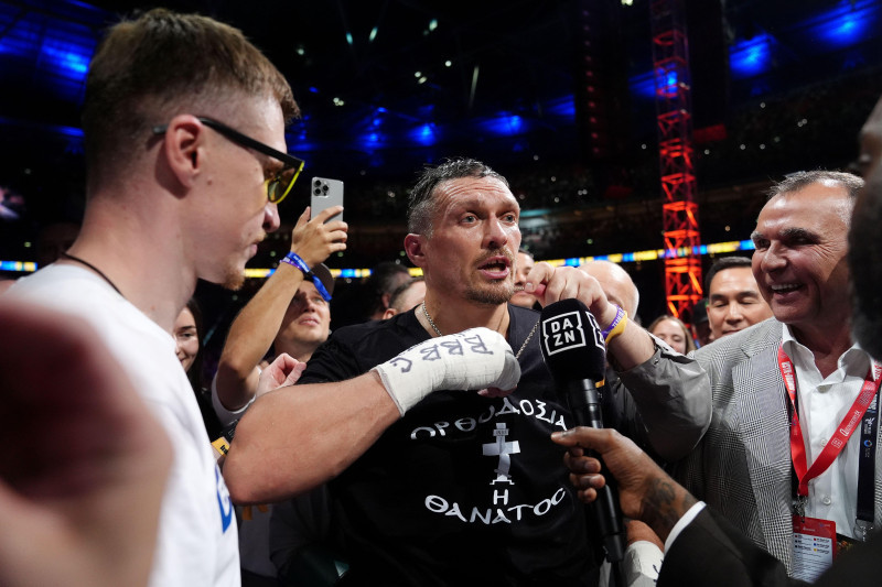Oleksandr Usyk speaks to the media after winning their IBF, IBO, WBC and WBO World heavyweight bout against Daniel Dubois at Wembley Stadium, London. Picture date: Saturday July 19, 2025.