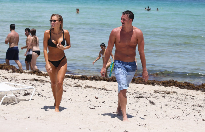 Ryan Lochte on the beach with wife, Kayla Rae Reid