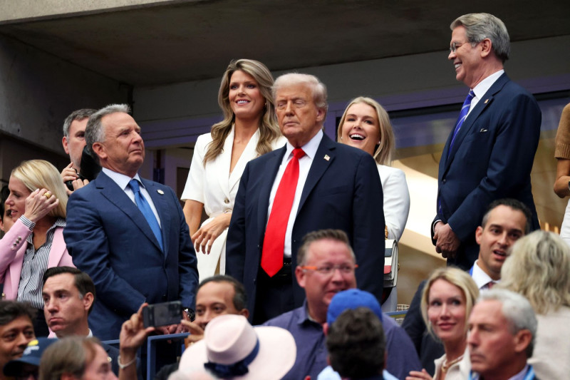 7 Septemeber, 2025 - Flushing Meadows, New York - United State President Donald R. Trump awaits the trophy ceremony while Envoy Steve Witkoff, left, and Treasury Secretary Scott Bessent, right, look on as all attended the man’s final between Jannik Sinne