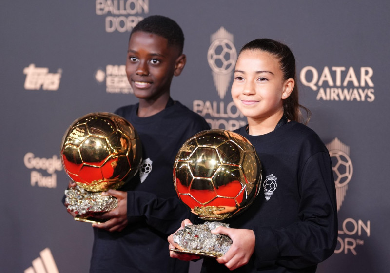 Mascots carry the Ballon d'Or trophies to the Ballon d'Or awards ceremony 2025, at the Theatre du Chatelet in Paris, France. Picture date: Monday September 22, 2025.