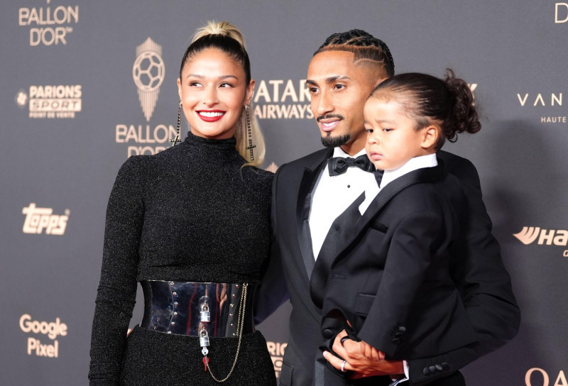 Natalia Rodrigues Belloli and Raphinha arriving at the Ballon d'Or awards ceremony 2025, at the Theatre du Chatelet in Paris, France. Picture date: Monday September 22, 2025.