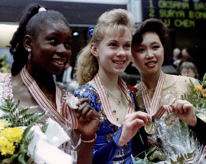The top three winners of the ladies figure skating event L-R France's silver medalist Surya Bonaly, ..