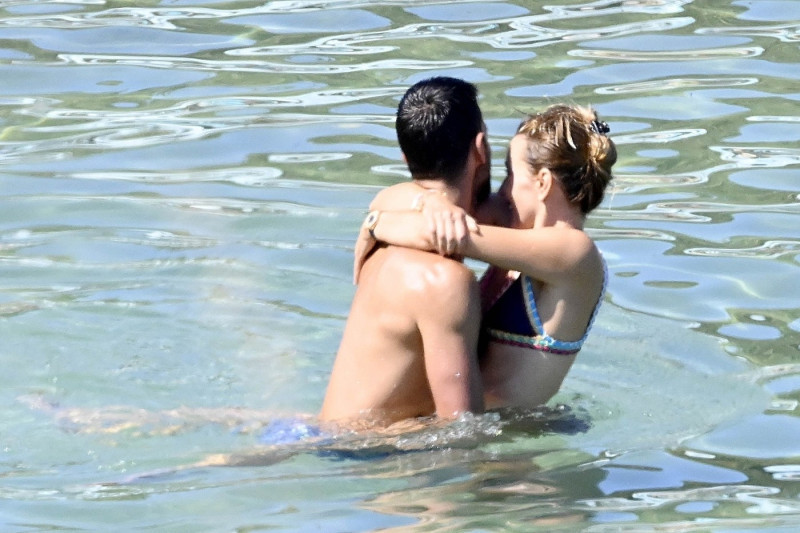 *EXCLUSIVE* Novak Djokovic and wife Jelena pack on the PDA in the sea at Nammos Beach in Mykonos as they enjoy some romantic time away from the kids