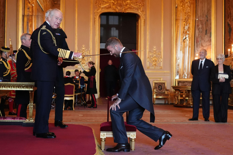 Sir David Beckham is made a Knight Bachelor by King Charles III during an Investiture ceremony at Windsor Castle, Berkshire. The honour recognises services to sport and to charity. Picture date: Tuesday November 4, 2025.