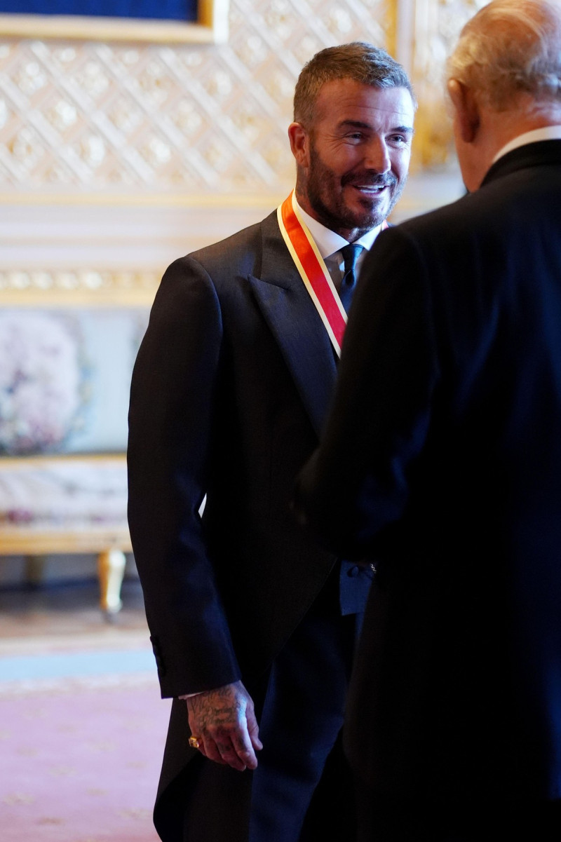 Sir David Beckham is made a Knight Bachelor by King Charles III during an Investiture ceremony at Windsor Castle, Berkshire. The honour recognises services to sport and to charity. Picture date: Tuesday November 4, 2025.
