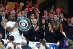 Emma Raducanu celebrates in the stands as England's Maro Itoje lifts the plate following the Quilter Nations Series match at the Allianz Stadium, London. Picture date: Saturday November 15, 2025.