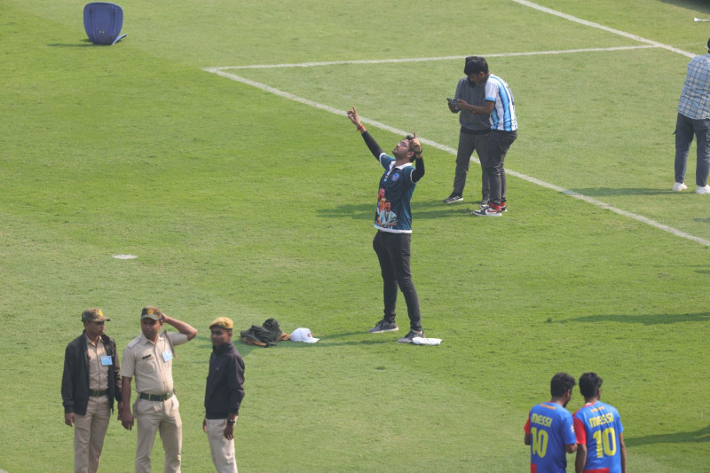 A Spectator raises his hands and celebrates destruction of Vivekananda Yuba Bharati Krirangan(VYBK) Stadium from a riot caused by miss management by the organisationduring Lionel Messi G.O.A.T tour 2025 in Kolkata City Of Joy at Vivekananda Yuba Bharati