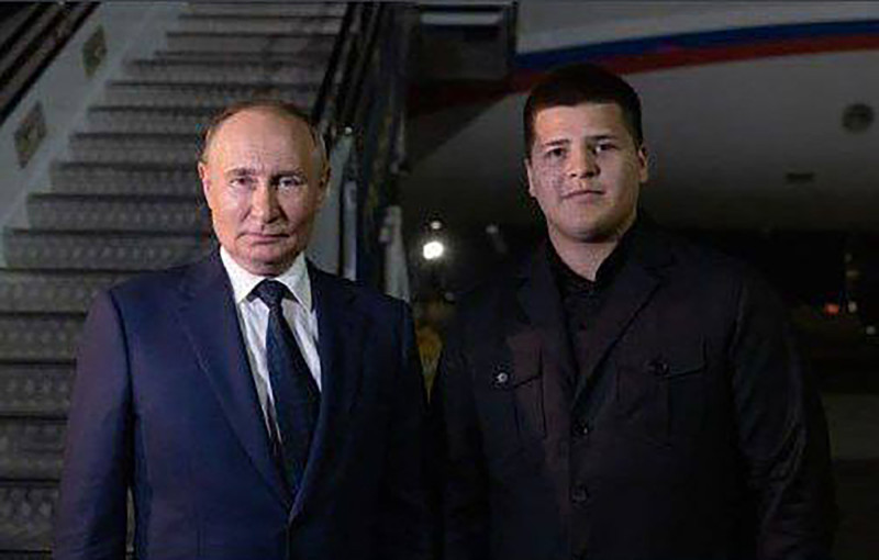 Adam Kadyrov, now 17, pictured with Russian president Vladimir Putin.