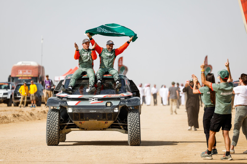 Yanbu, Arabie Saoudite. 17th Jan, 2026. 299 AL-ATTIYAH Nasser (qat), LURQUIN Fabian (bel), The Dacia Sandriders, Dacia, Ultimate, BF Goodrich, FIA W2RC, celebrating their win during the Finish of the Dakar 2026, on January 17, 2026 in Yanbu, Saudi Arabia