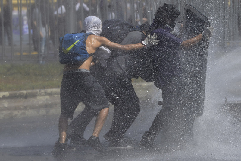 Protests In Santiago On The Second Anniversary of Piñera's Government