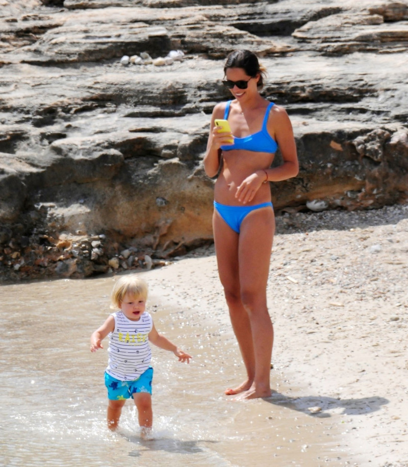 *EXCLUSIVE* WEB MUST CALL FOR PRICING - Former German footballer Bastian Schweinsteiger's wife Ana Ivanovic pictured looking stunning in a blue bikini as she is pictured spending some quality time on the beach with son in Majorca.