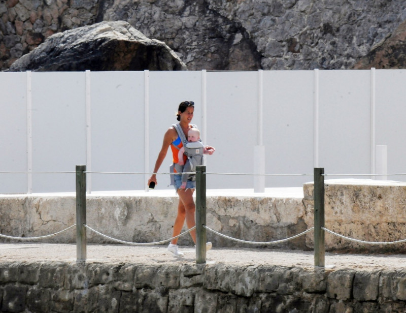 *EXCLUSIVE* WEB MUST CALL FOR PRICING - Former German footballer Bastian Schweinsteiger's wife Ana Ivanovic pictured looking stunning in a blue bikini as she is pictured spending some quality time on the beach with son in Majorca.