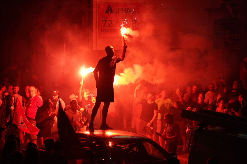 Fans Celebrate Liverpool FC Winning The Premier League Title