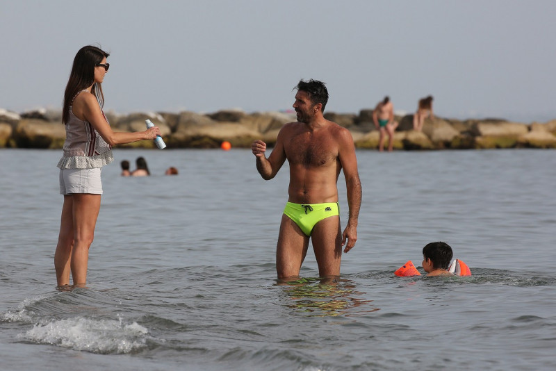 EXCLUSIVE: Gianluigi Buffon Takes His Son Leopoldo Mattia For First Swim In The Sea