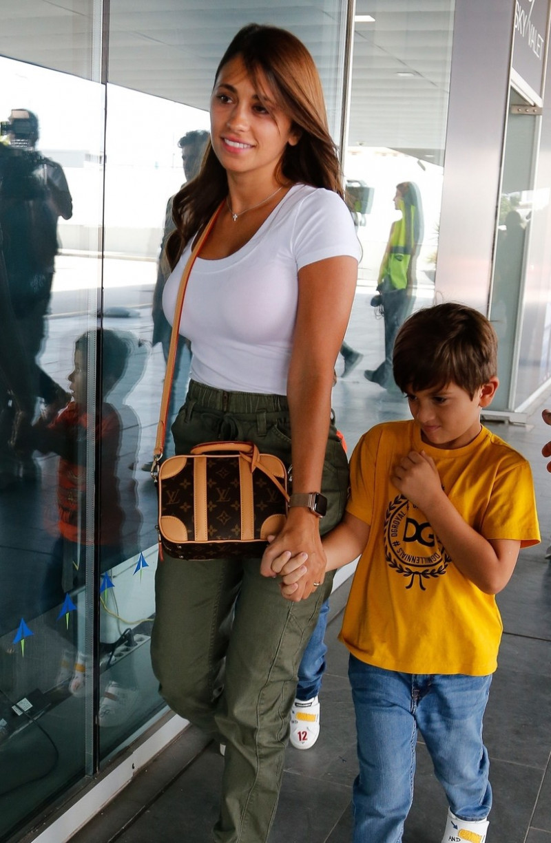 *EXCLUSIVE* Argentinian and Barcelona superstar Lionel Messi is spotted with his wife Antonella Roccuzzo and children at Barcelona Airport