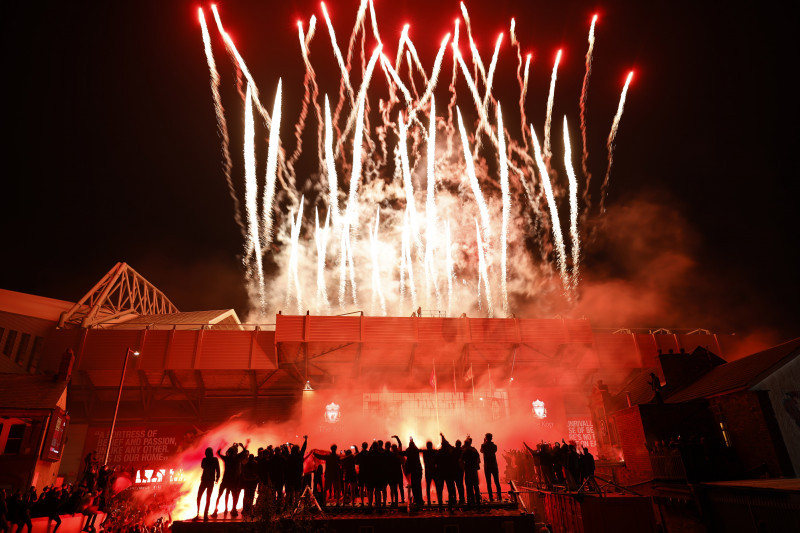 Fans Celebrate As Liverpool FC Lift The Premiership Trophy At Anfield