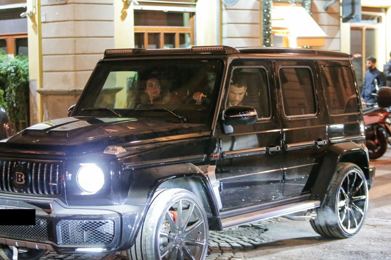 *EXCLUSIVE* Juventus Madeiran superstar footballer Cristiano Ronaldo gets mobbed by fans while leaving a restaurant after he was gifted a £600,000 Mercedes G wagon BRABUS V12 for his 35th Birthday by girlfriend Georgina Rodriguez!