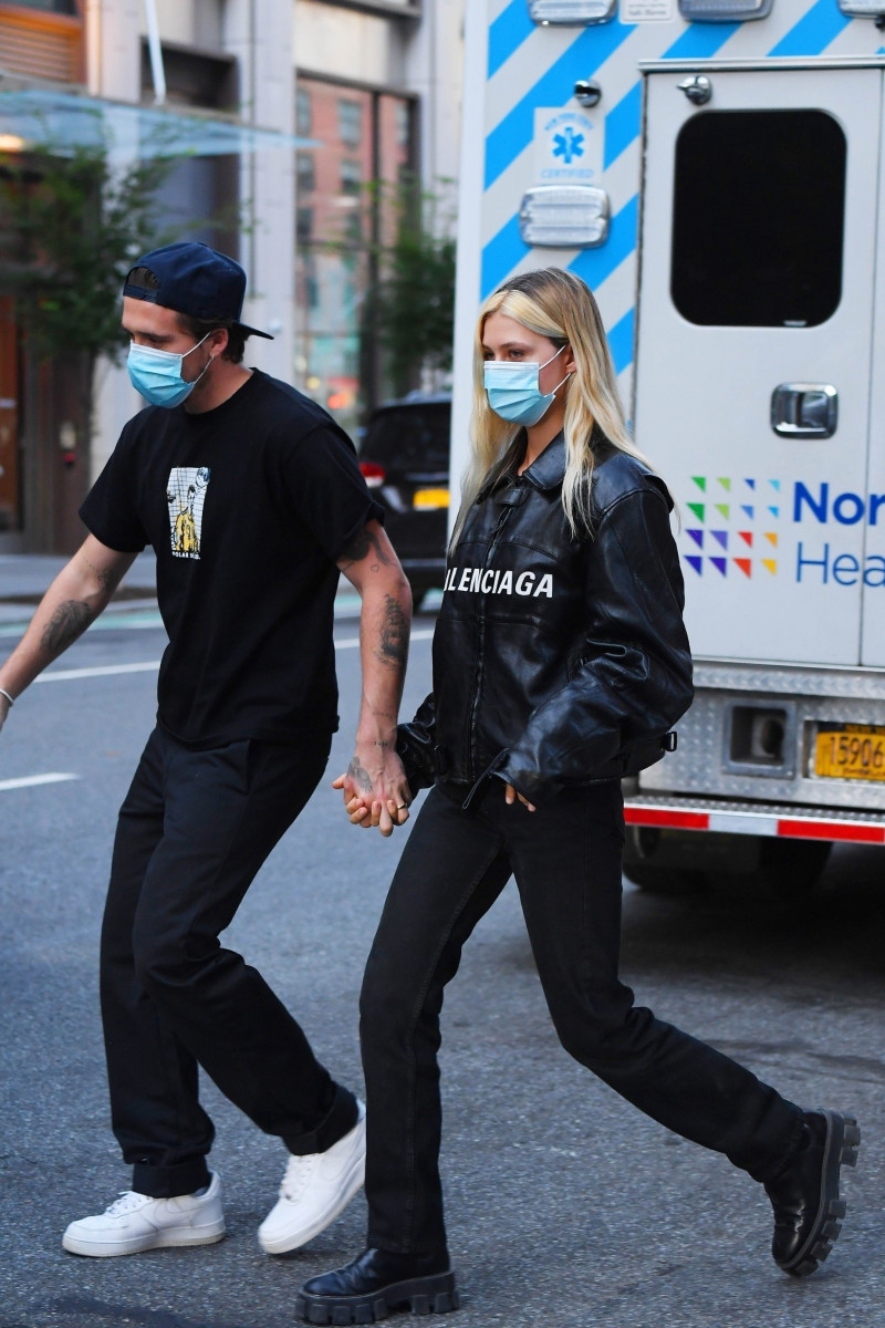 Brooklyn Beckham and fiancée Nicola Peltz hold hands while heading out in SoHo