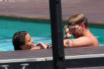 *EXCLUSIVE* Danish professional footballer Nicklas Bendtner and his girlfriend Philine Roepstorff have some fun in the sun as they enjoy a break in Tremezzo, Italy.