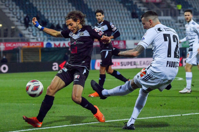 Lugano, Switzerland. 29th Nov, 2020. Andrea Padula (#72 FC Basel 1893) and Numa Lavanchy (#16 FC Lugano) in action during the Swiss Super League match between FC Lugano and FC Basel 1893 Cristiano Mazzi/SPP Credit: SPP Sport Press Photo. /Alamy Live News