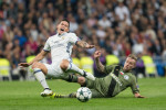 Madrid, Spain. 18th October, 2016. Real Madrid's Colombian midfielder James Rodriguez and Thibault Moulin of Legia Warszawa during the UEFA Champions League match between Real Madrid and Legia Warszawa at the Santiago Bernabeu Stadium in Madrid, Tuesday,