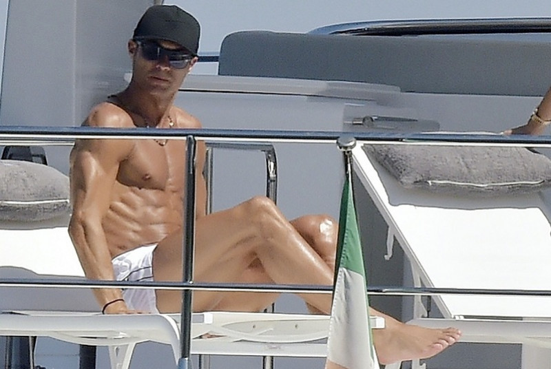 *EXCLUSIVE* Juventus FC footballer Cristiano Ronaldo and his partner Georgina Rodriguez pictured relaxing with friends on a yacht in Portofino.