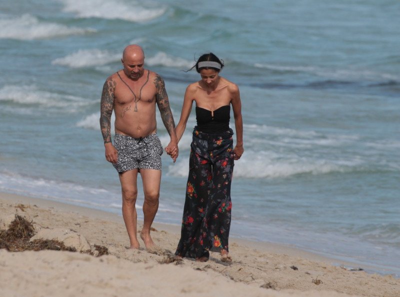 EXCLUSIVE: Jorge Sampaoli shirtless with his wife on holiday